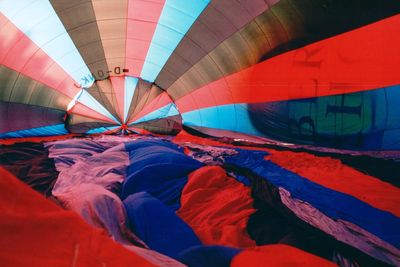 Multi colored parachute on field