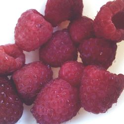 Close-up of strawberry over white background