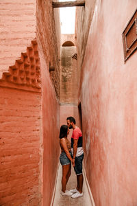 Couple kissing each other in the star-studded streets of marrakesh in morocco