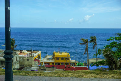 Scenic view of sea against blue sky