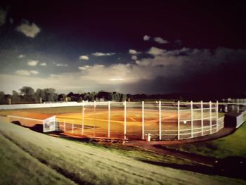 Scenic view of field against sky at dusk