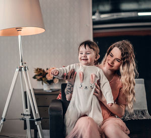 Portrait of happy family at home