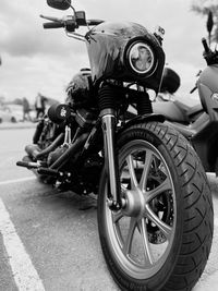 Close-up of bicycle parked on road