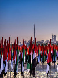 A view of burj khalifa through uae flags