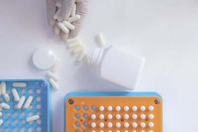 Close-up of objects on table against white background