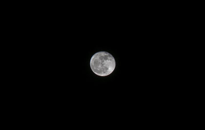 Scenic view of moon against dark sky