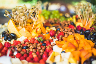 Close-up of fruits arranged in plate