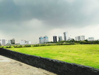 View of city against cloudy sky