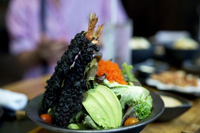 Close-up of vegetables in plate on table