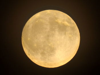 Low angle view of moon against sky at night