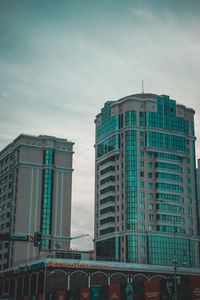 Low angle view of modern buildings against sky