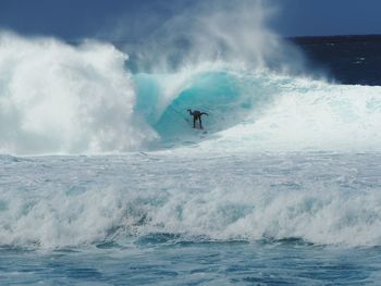 Man surfing in sea