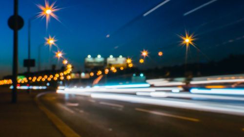 Light trails on road at night