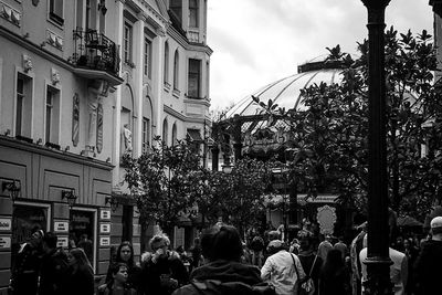 Group of people in front of building