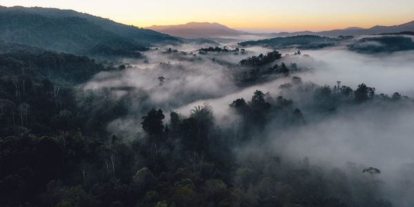 Scenic view of mountains against sky during sunset