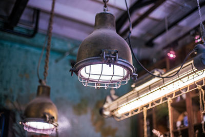 Low angle view of illuminated pendant light