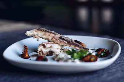 Close-up of meat in plate on table