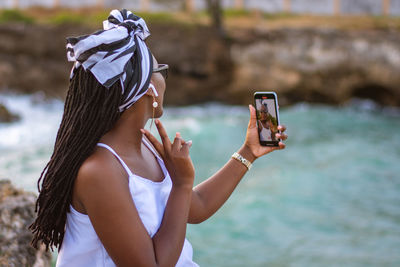 Woman using mobile phone