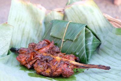 Close-up of food served on leaves