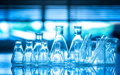 Close-up of laboratory glassware on table