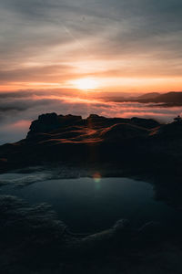 Scenic view of sea against sky during sunset