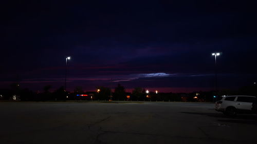 Illuminated street light at night