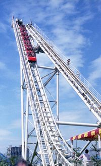 Low angle view of ferris wheel against sky