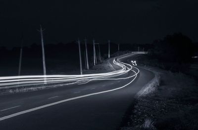 Light trails on road at night