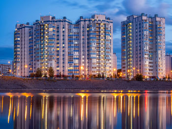 Illuminated buildings in city at night