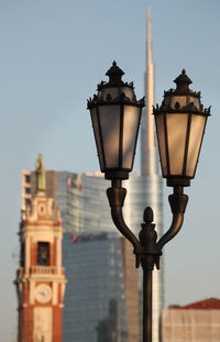 Street light against building