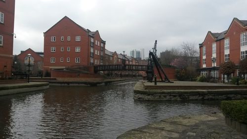 View of canal along buildings