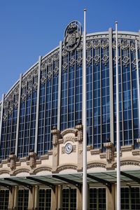 Low angle view of barcelona nord against clear blue sky