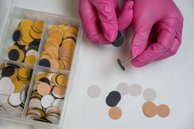 Cropped hand of person working on table