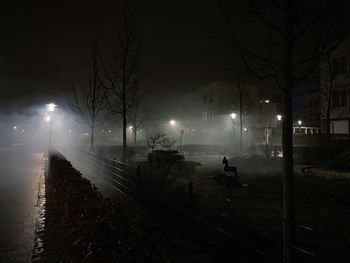 View of illuminated street at night
