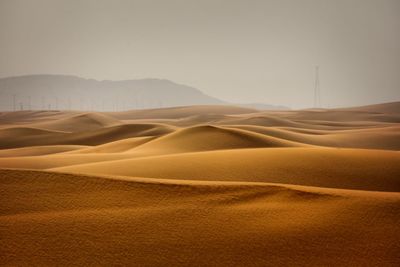 Scenic view of desert against clear sky