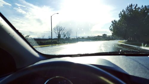 Road seen through car windshield