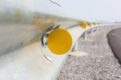 Reflector on a road guard.