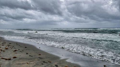 Scenic view of beach against sky