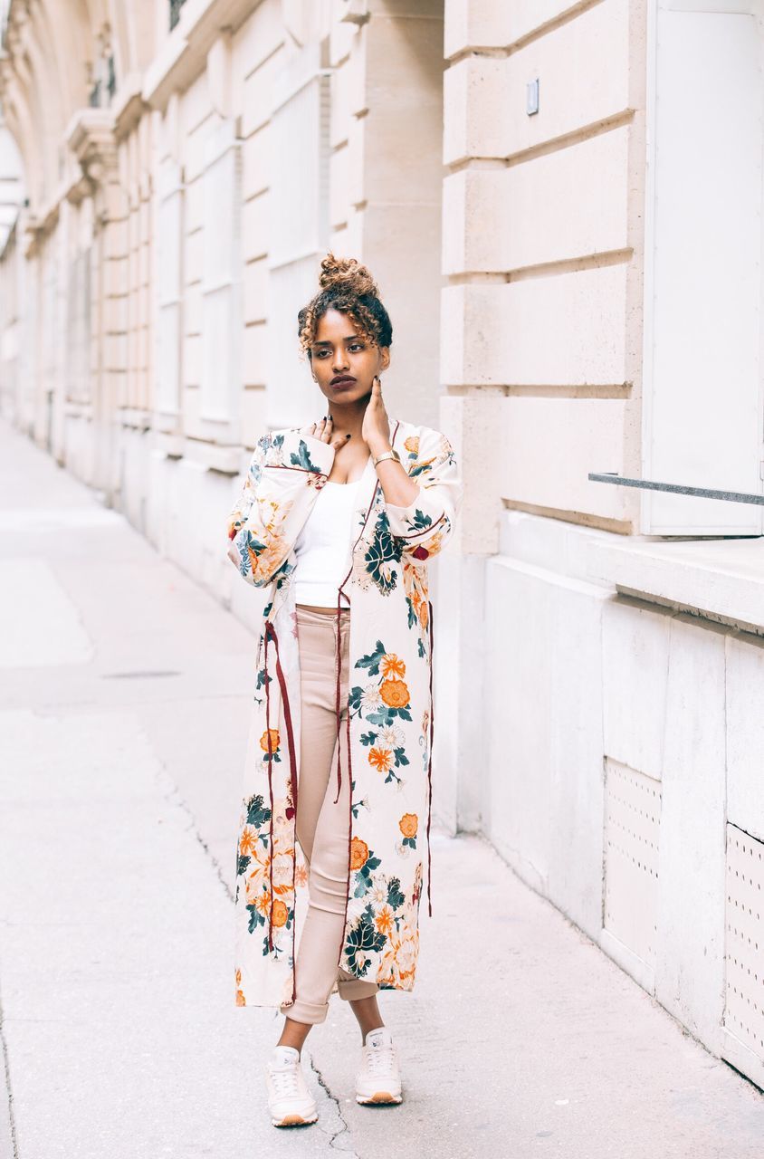 full length, one person, beautiful woman, young adult, outdoors, front view, young women, real people, lifestyles, fashion, day, beauty, built structure, women, building exterior, portrait, architecture, city, adult, people