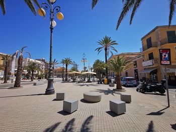 Panoramic view of people on street in city