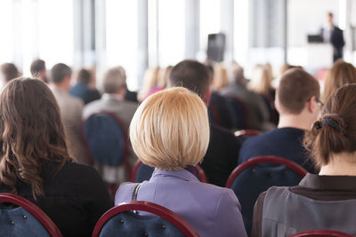 Rear view of people in seminar