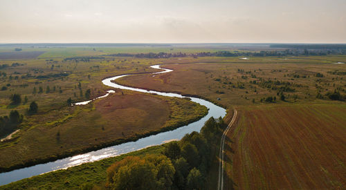 High angle view of road amidst landscape against sky