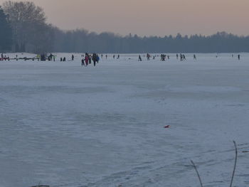 People on snow covered landscape