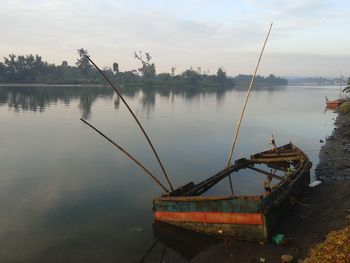 Boats in calm lake