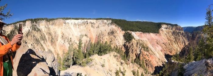 Panoramic view of rocky mountains against sky