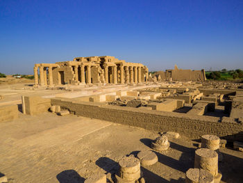 View of temple against clear blue sky