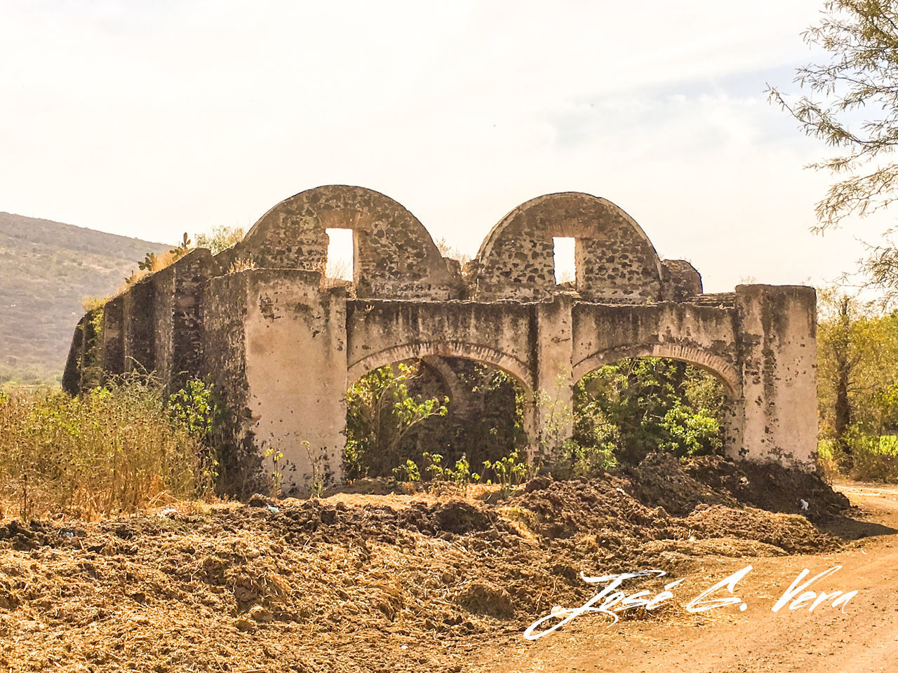 architecture, built structure, history, building exterior, old ruin, arch, the past, old, ancient, sky, abandoned, stone wall, tree, ancient civilization, travel destinations, damaged, famous place, ruined, castle, run-down