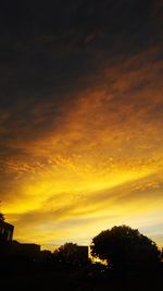 Scenic view of dramatic sky during sunset