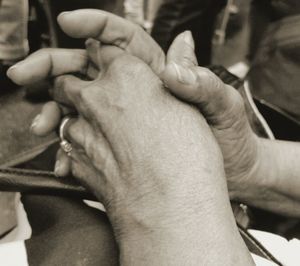 Cropped image of woman holding hands