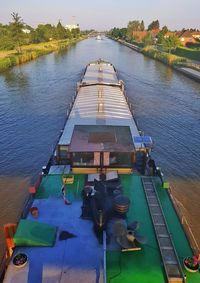 High angle view of pier amidst river against sky